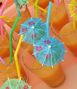 Orange drinks with umbrellas. 