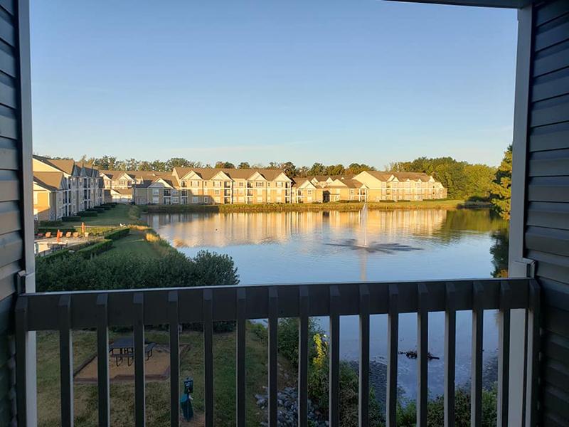 Balcony overlooking the community pond at Bridgewater at Town Center Apartments in Hampton. 