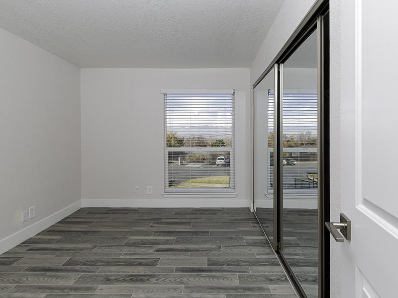 One Bedroom Apartments in Salt Lake City, UT - Foothill Place Apartments Bedroom with a Large Window and Spacious Layouts