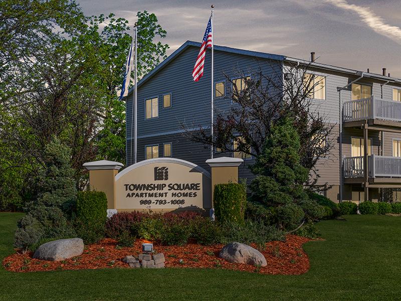 Welcome Sign | Township Square Apartments in Saginaw, MI