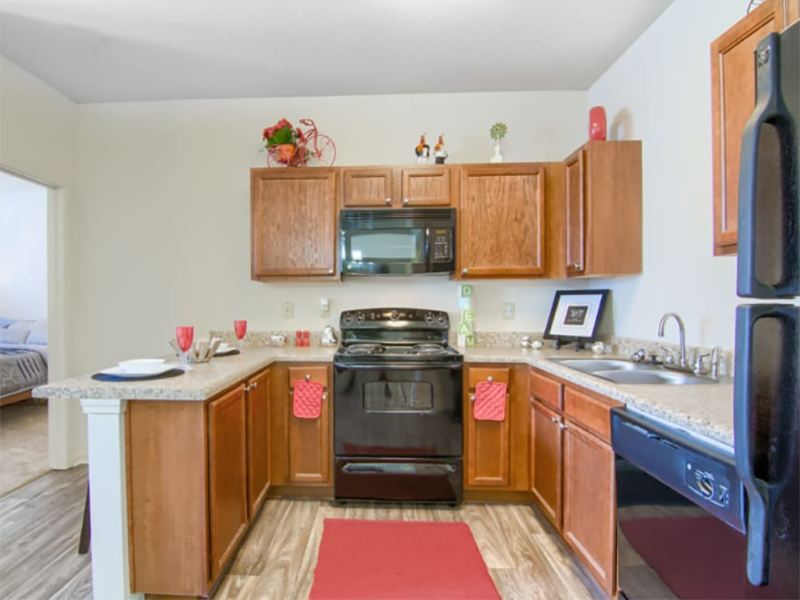 Fully Equipped Kitchen | Woodside Apartments in Mobile, AL