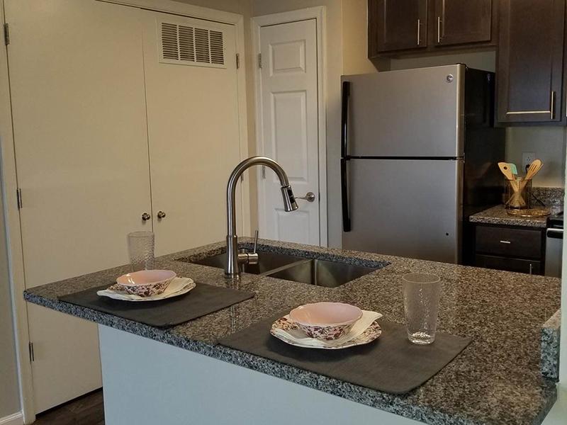 Breakfast bars in the kitchens at Bridgewater at Town Center Apartments in Hampton.