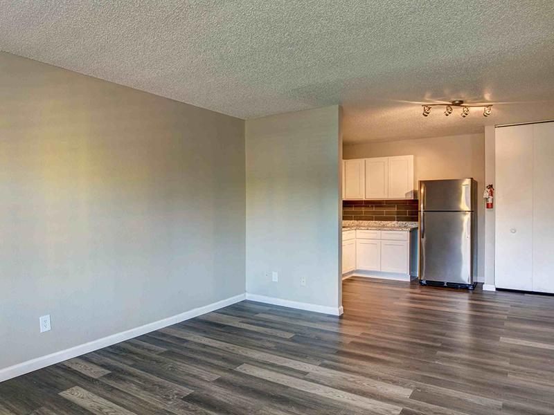Living Room and Kitchen | Park 67 Apartments in Glendale, AZ