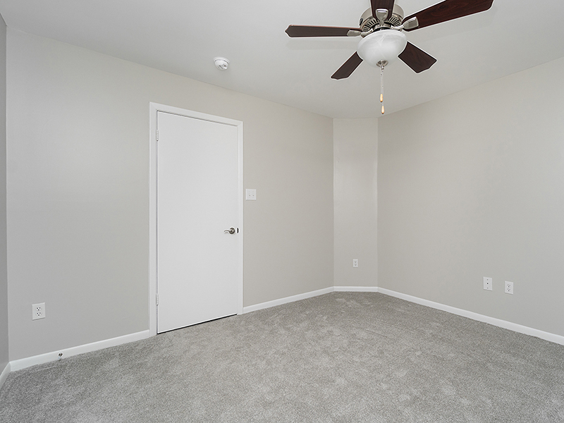 Bedroom with Ceiling Fans | Orchard Park Apartments in Greenville, SC