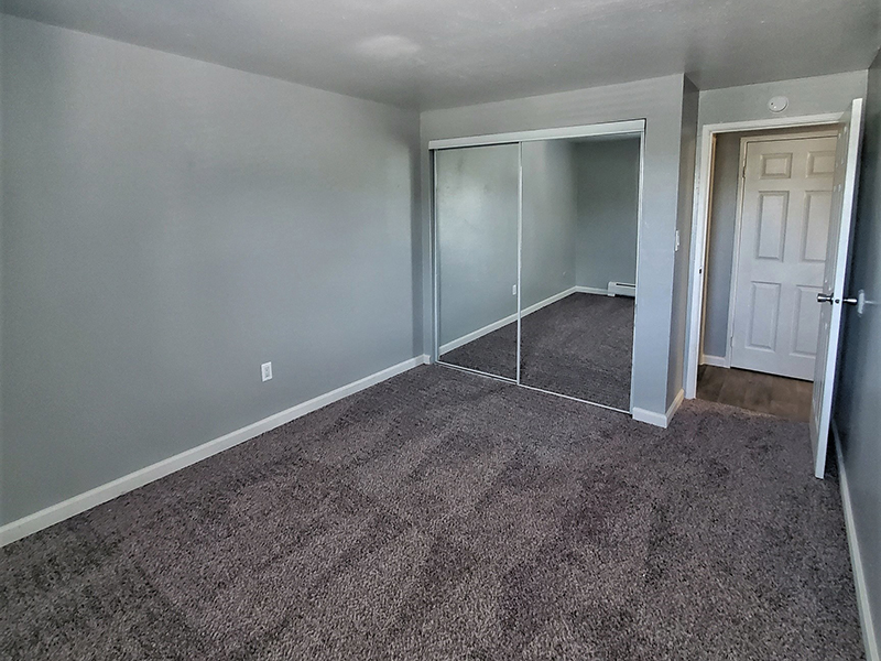 Bedroom | Riviera Apartments in Northglenn, CO
