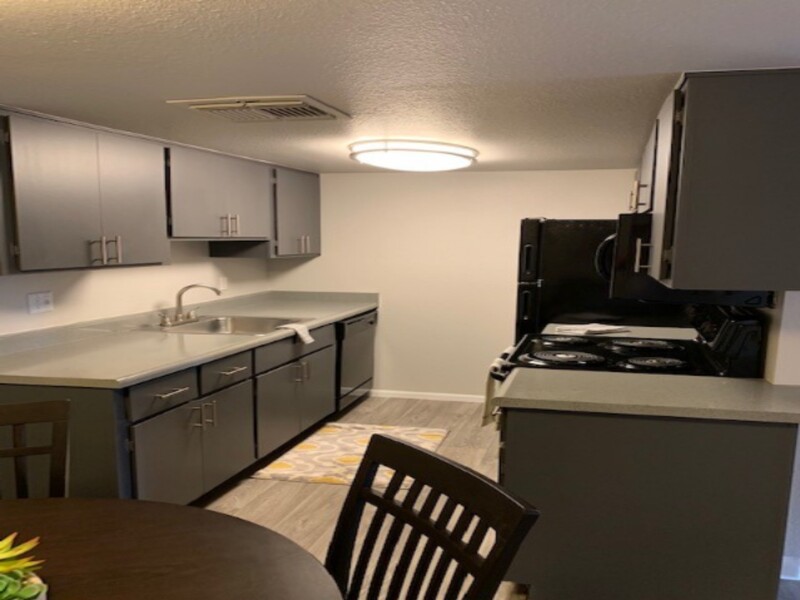 Dining Room and Kitchen | Sun Wood Senior Apartments in Peoria, AZ