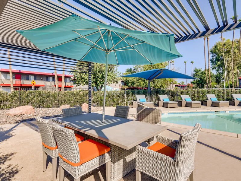 Poolside Table | Omnia McClintock Apartments in Tempe, AZ
