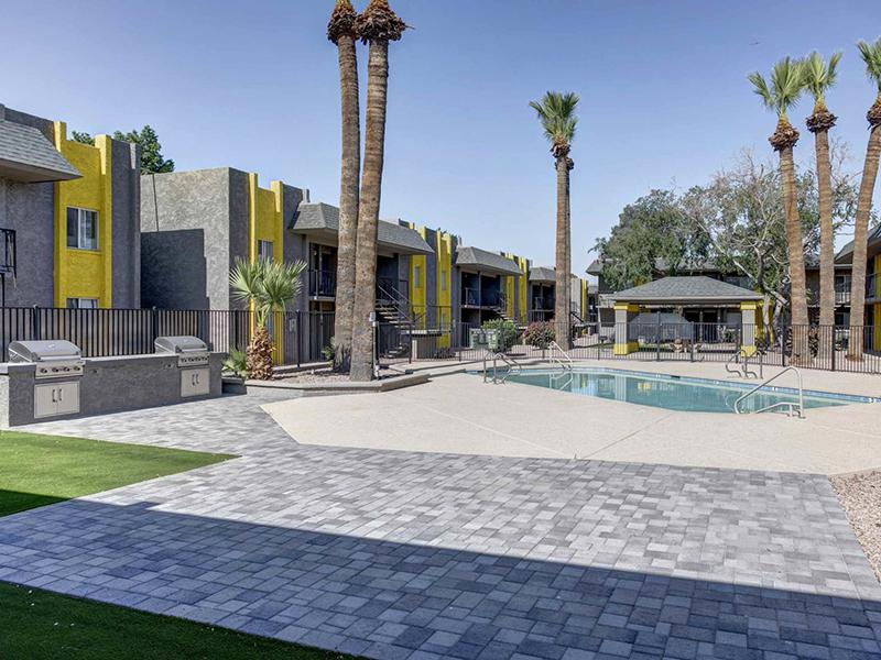 Pool and Grill Area | Park 67 Apartments in Glendale, AZ