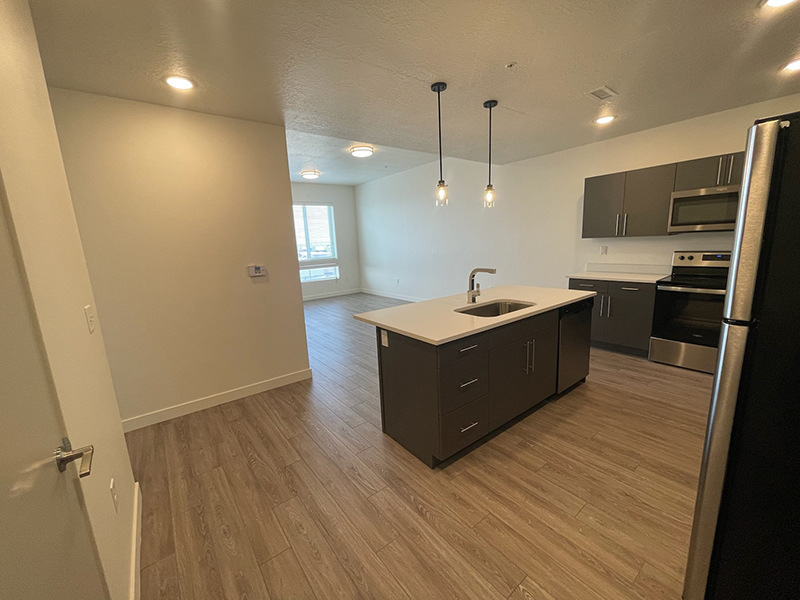 Kitchen with Pendant Lighting | Canyon Vista Apartments in Draper, UT