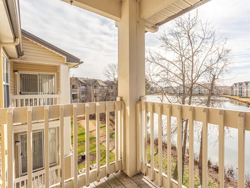 Apartment with a balcony overlooking the pond at Bridgewater at Town Center in Hampton.