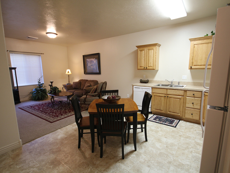 Dining Room and Front Room | Liberty Square Apartments in Ammon, ID