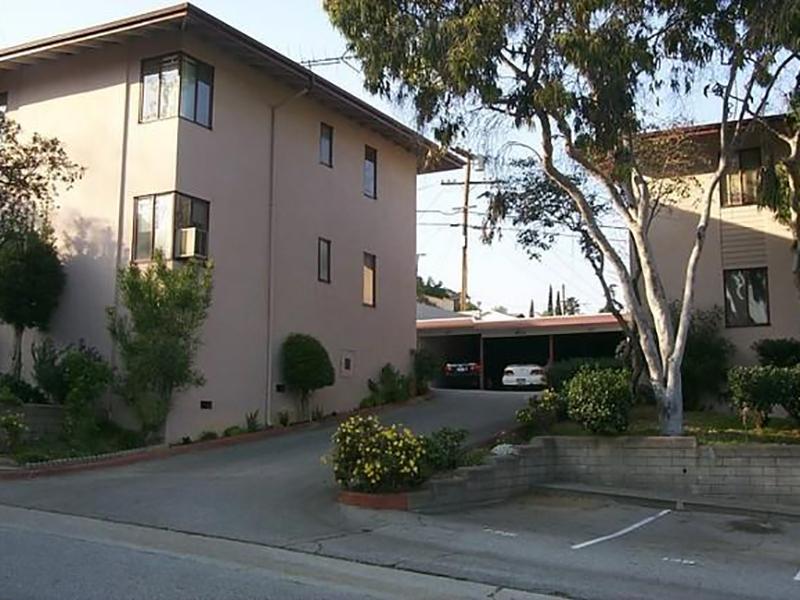 Los Angeles Apartments for Rent - Exterior View of Verdugo Mesa Apartments with Lush Foliage