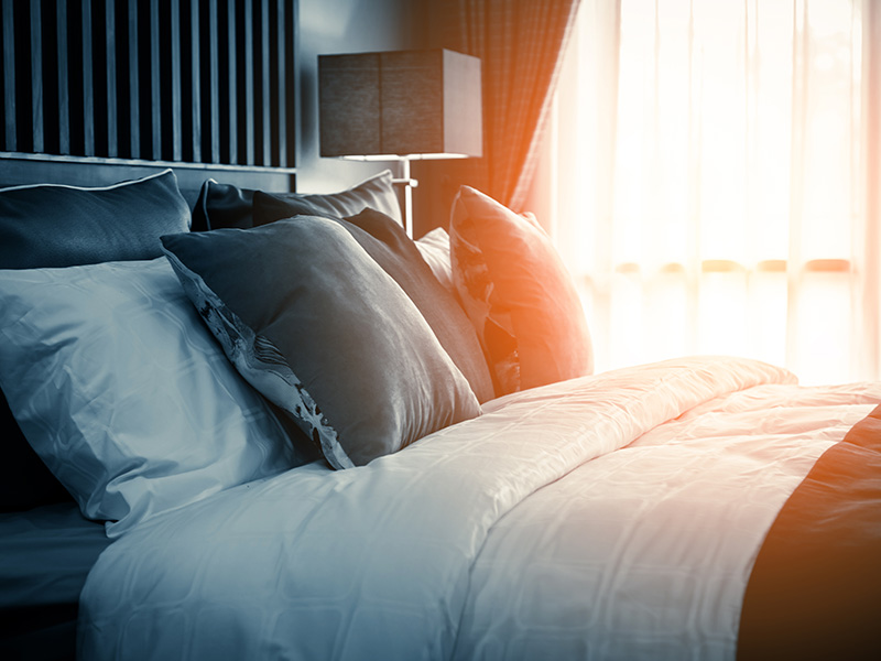 Bed | Green Print at the Trax Apartments in Salt Lake City, UT