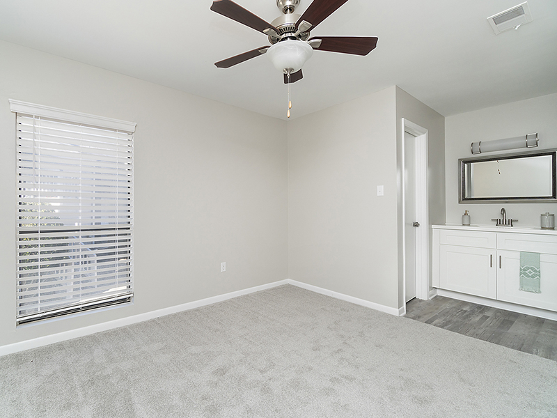 Bedroom and Bathroom | Orchard Park Apartments in Greenville, SC