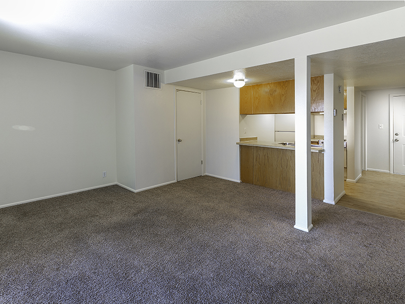 Living Room and Kitchen | Lookout Pointe Apartments in Provo, UT
