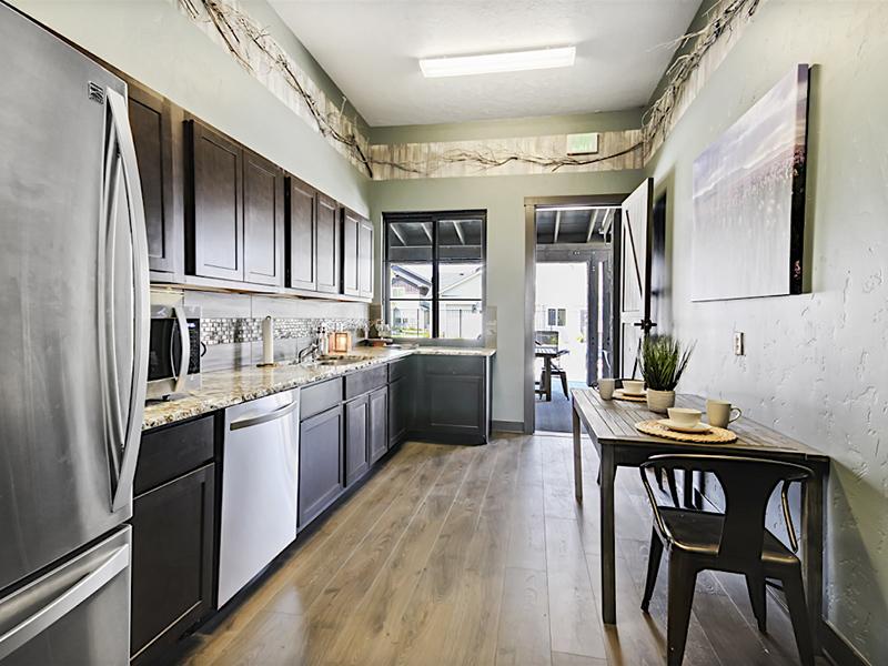 Clubhouse Kitchen With Exit | Cottages at Stonesthrow in Meridian, ID