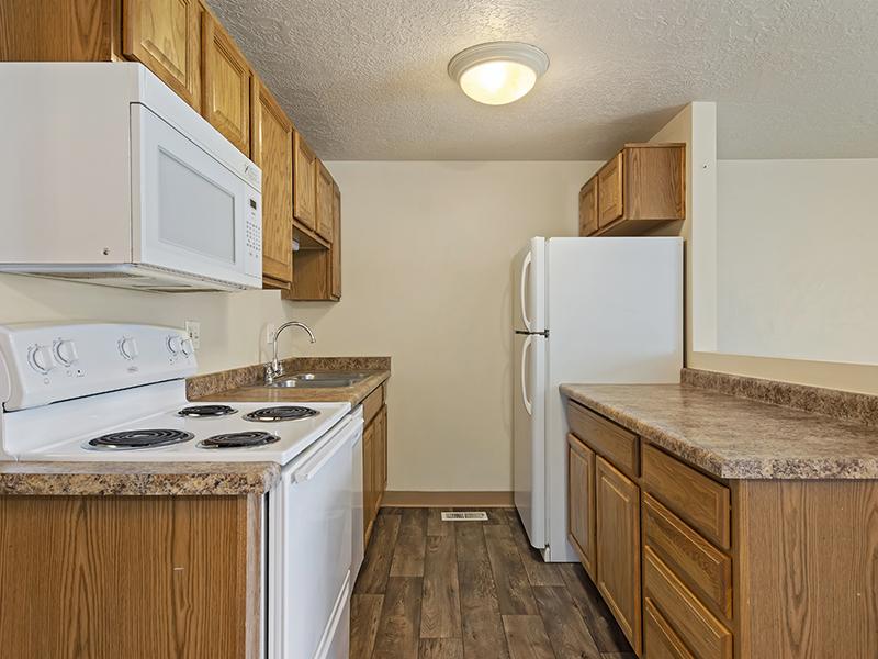 Fully Equipped Kitchen | Woodside at Holladay Apartments in Salt Lake City, UT