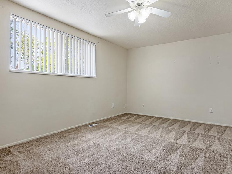 Bedroom with Ceiling Fan | Woodside at Holladay Apartments in Salt Lake City, UT