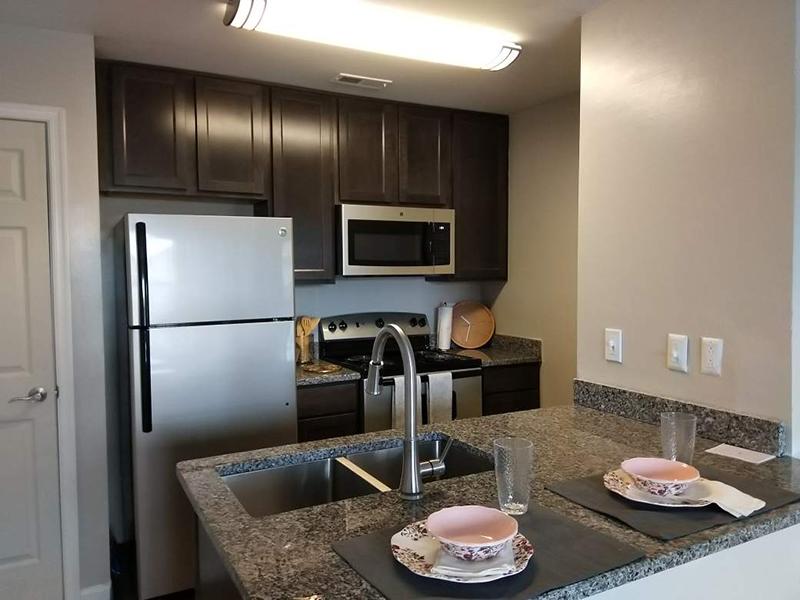 Breakfast bars in the kitchens at Bridgewater at Town Center Apartments in Hampton.