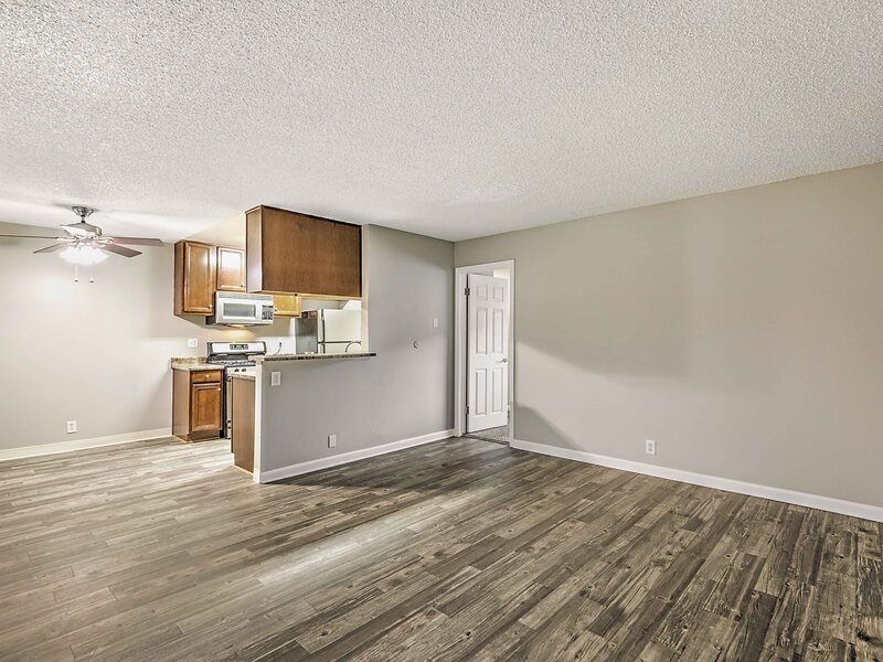 Front Room and Kitchen | Atwater Cove Apartments in Costa Mesa, CA