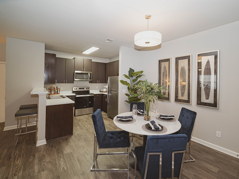 Dining Room and Kitchen | Reserve at Stone Hollow Apartments in Charlotte, NC