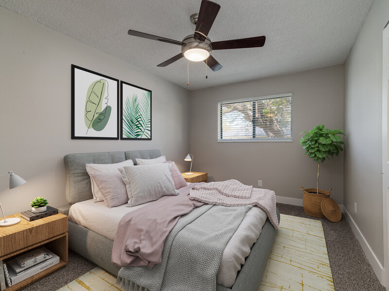 Bedroom with a Ceiling Fan - Furnished | Villas Del Sol II Apartments in Albuquerque, NM