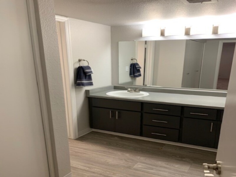 Bathroom Counter | Sun Wood Senior Apartments in Peoria, AZ