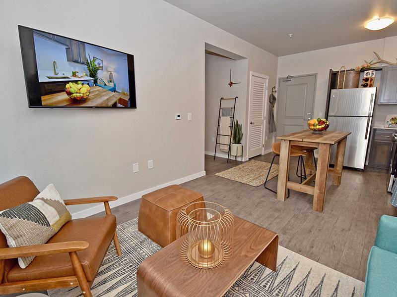 Living Room With Hardwood Floors At Coburn Crossing