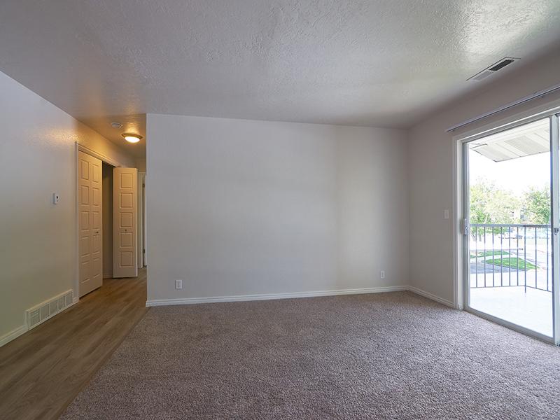 Living Room | Balcony | Willow Cove Apartments