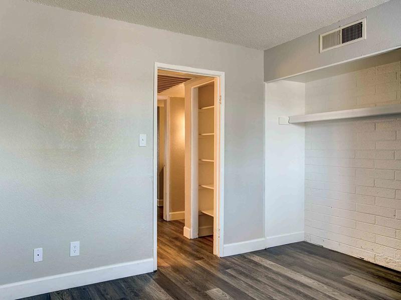 Bedroom and Hallway | Park 67 Apartments in Glendale, AZ