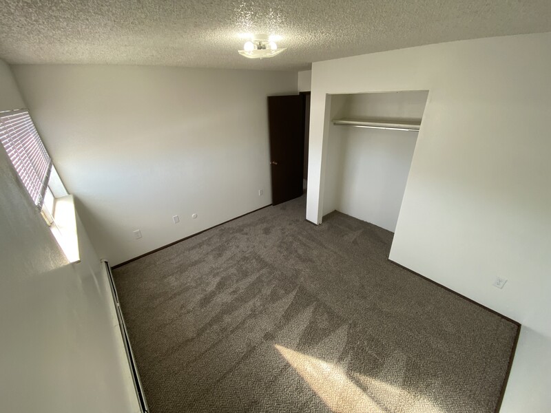 Bedroom Closet | Conquistador Apartments in Casper, WY