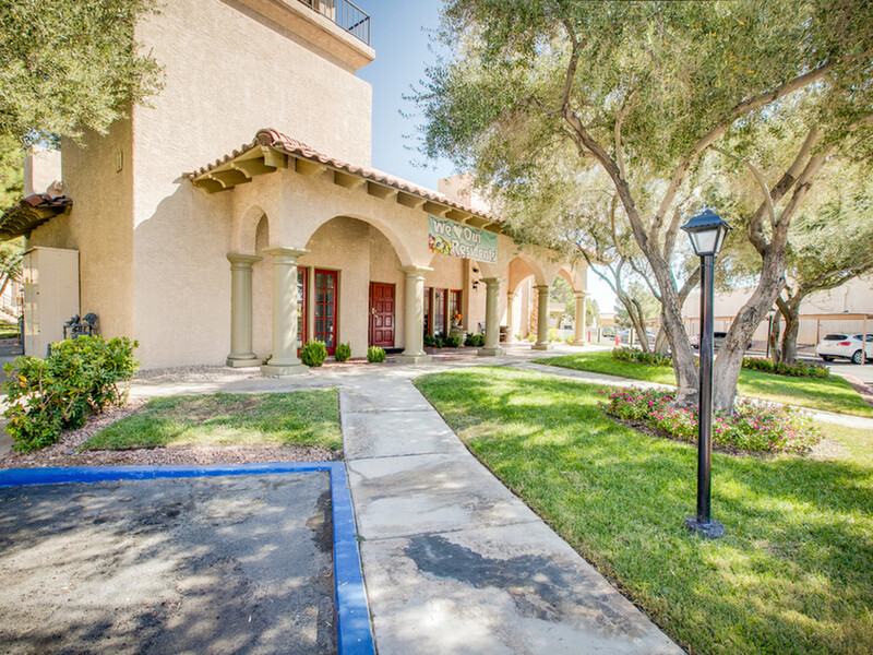 Clubhouse Exterior | Village of Santo Domingo Apartments in Las Vegas, NV