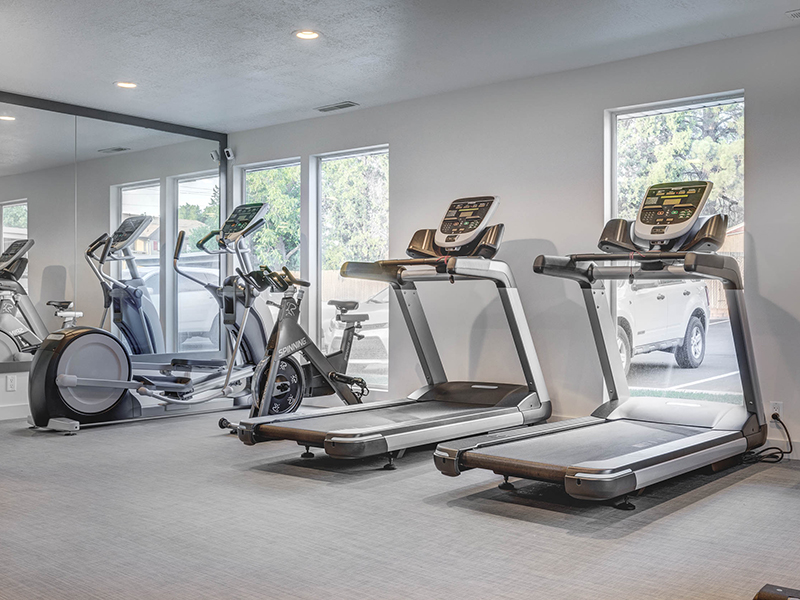 Midvale UT Apartments - Creekview Apartments - Fitness Center with Exercise Equipment like Ellipticals and Treadmills