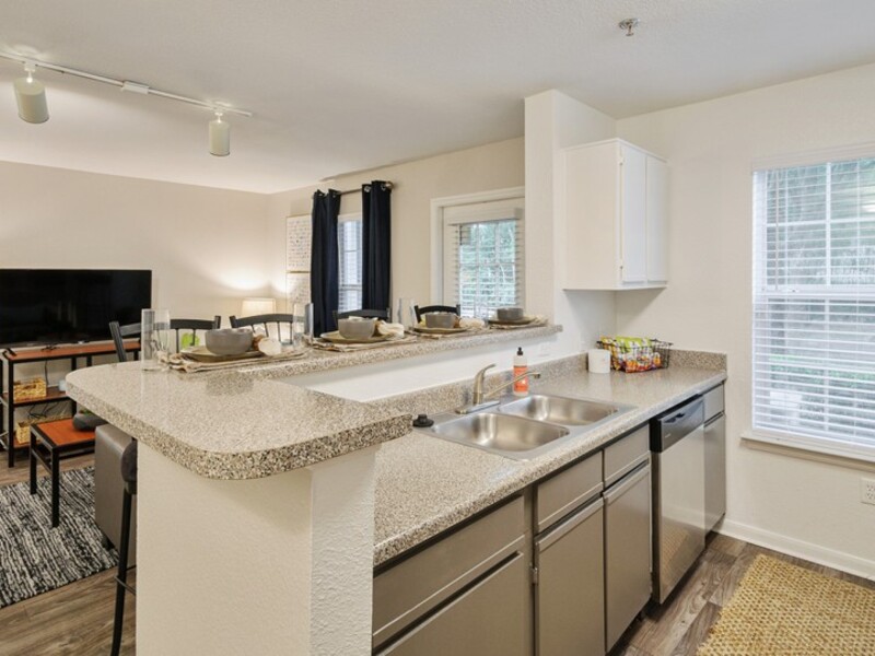 Kitchen and Living Room | ACASA Bainbridge Apartments in Tallahassee, FL