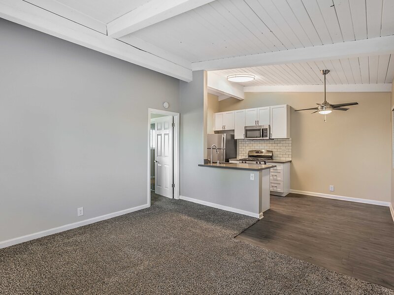 Living Room and Kitchen | Atwater Cove Apartments in Costa Mesa, CA
