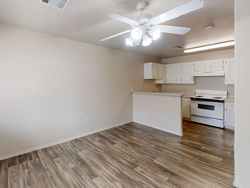 Living Room and Kitchen | Sunrise Senior Village Apartments in Las Vegas, NV