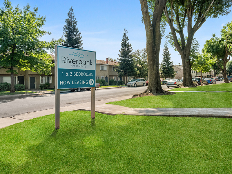 Sign | Riverbank Apartments