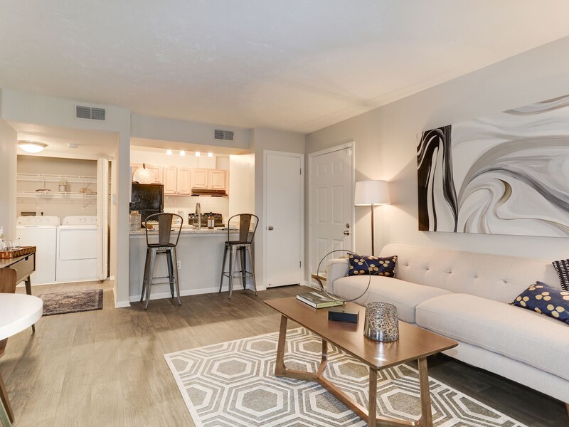 Living Room and Kitchen | The Madison at Eden Brook Apartments in Columbia, MD