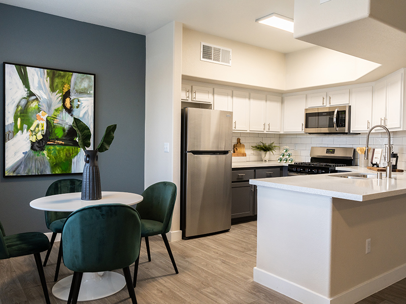 Dining Area & Kitchen | St. Clair Apartments in Las Vegas, NV