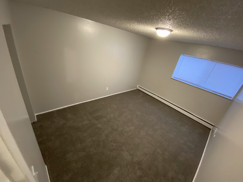 Large Bedroom | Conquistador Apartments in Casper, WY