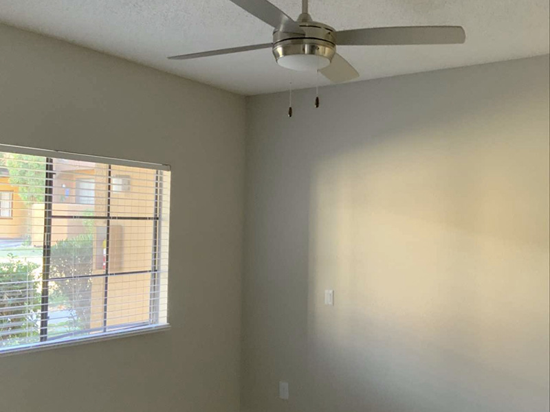 Bedroom With Ceiling Fan | Desert Ridge Apartments in Las Vegas, NV