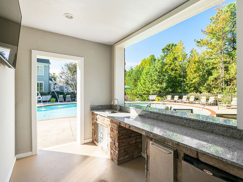 Poolside Lounge | Millennium Apartments