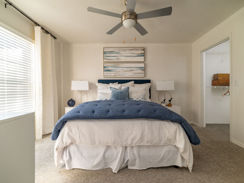 Bedroom with a Ceiling Fan | La Ventana Apartments in Albuquerque, NM