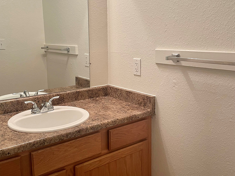 Bathroom Vanity | The Reserve at Water Tower Village Apartments in Arvada, CO
