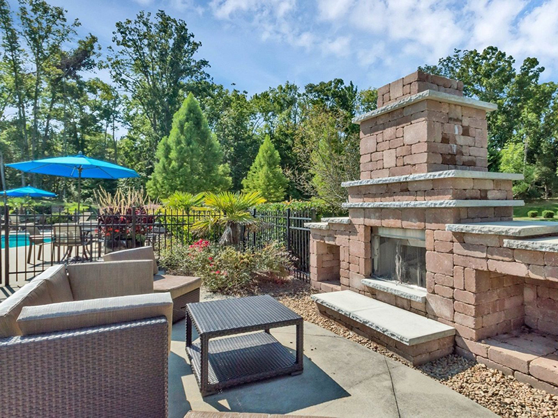 Outdoor Fireplace | Reserve at Stone Hollow Apartments in Charlotte, NC