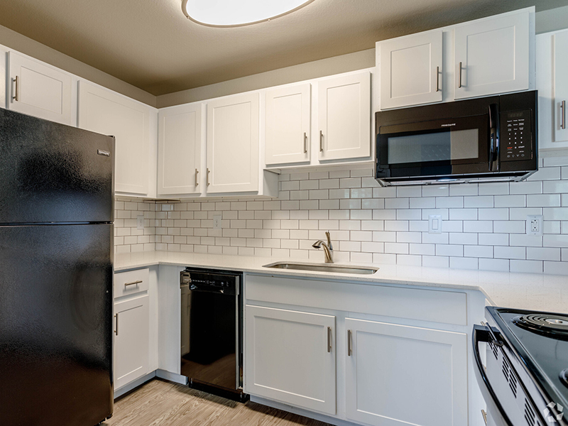Renovated Fully Equipped Kitchen | The Arbors at Sweetgrass Apartments in Fort Collins, CO