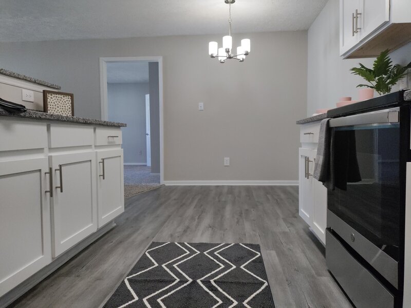 Kitchen and Dining Area | Hidden Lake Apartments in Fayetteville, NC